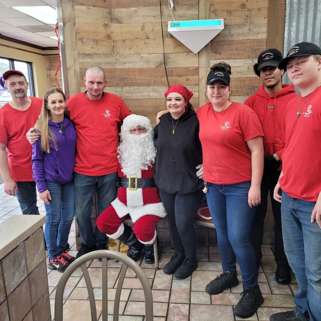 What a Burger Team With Sant Claus Cross Dresser
